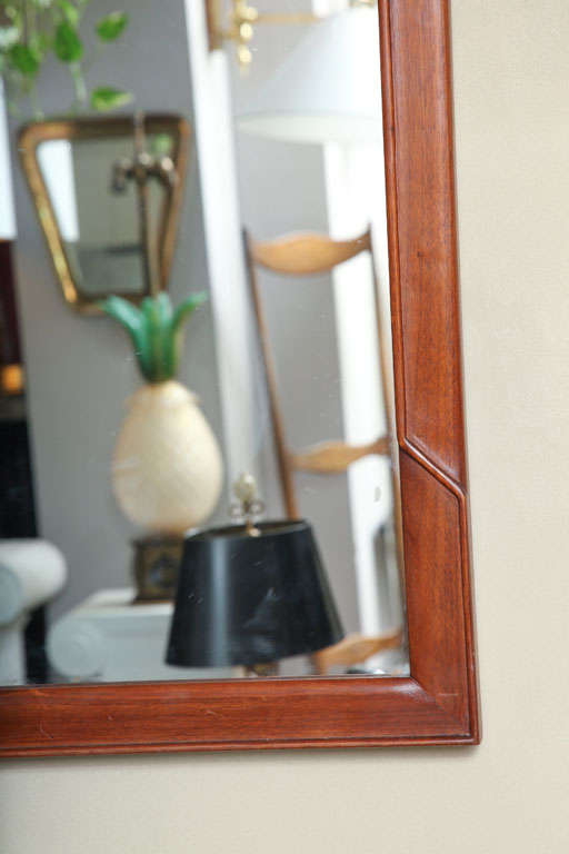 American A 1950's Modernist walnut Mirror by Edward Wormley