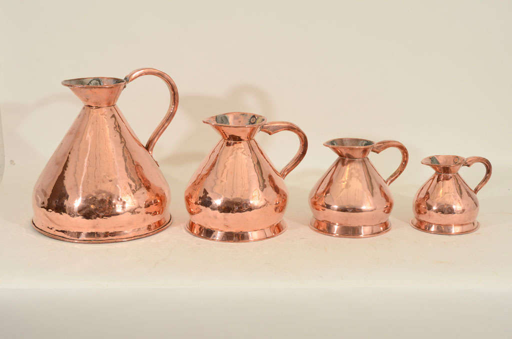 Set of 4 Graduated Copper Cider Measures, England, Late 19th C.