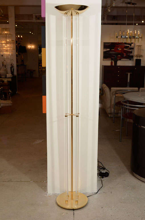 Exceptional Lucite rod and Brass Torchiere sold thru the Charles Hollis Jones showroom.