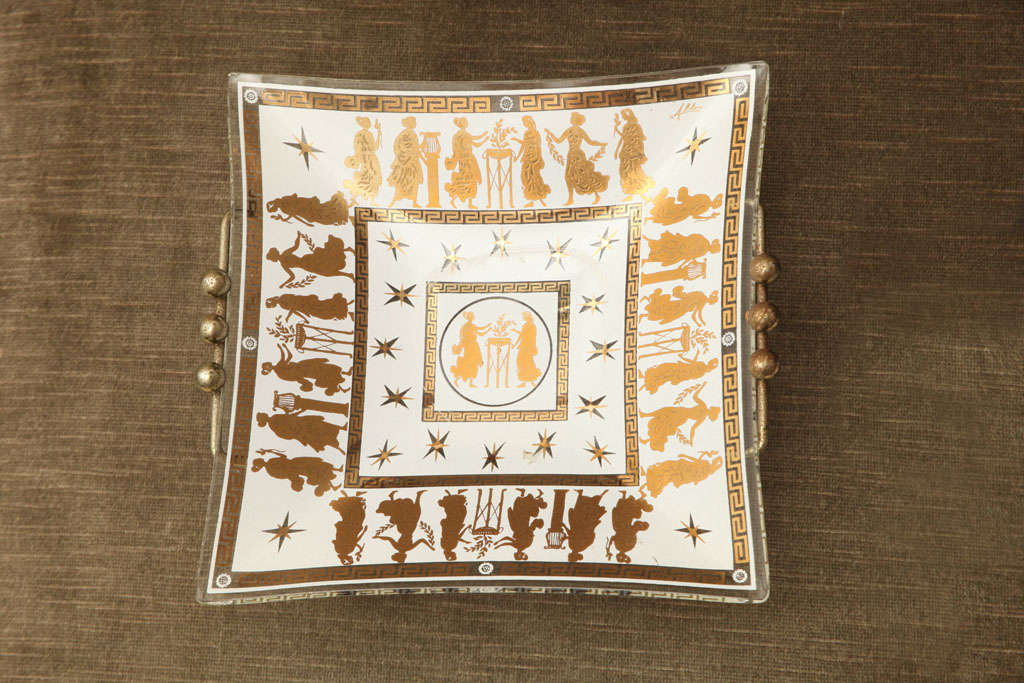 Square glass dish with gold classical figurines, Greek key border and brass ball handles by Georges Briard, c. 1960