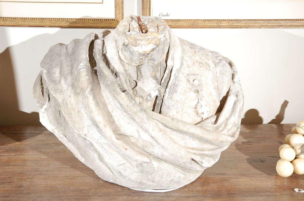 Large plaster marble torso.