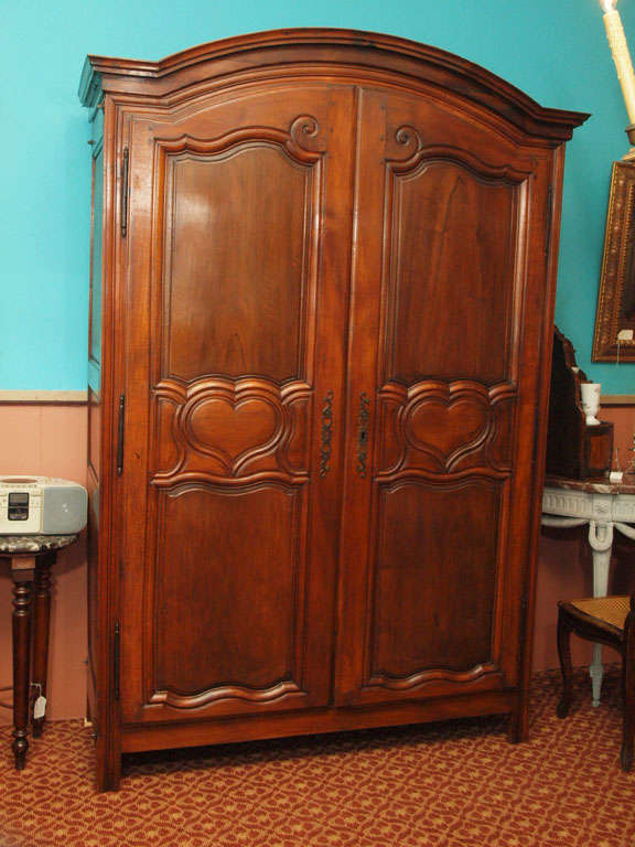 Charming French Regence/Louis XV transition period walnut armoire, with 