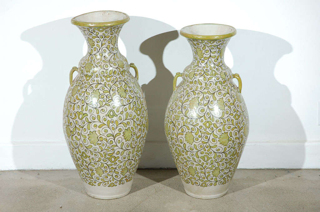 Pair of green large Moroccan vases with Handles.
Very nice handmade and hand-painted pair of Moroccan large ceramic vases from Fez.
Very nice design with light sage green leafs and flowers.
One of the vase is smaller, it is 31