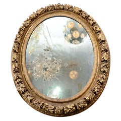 19th Century French Carved Wood and Gold Gilded Gesso Oval Mirror