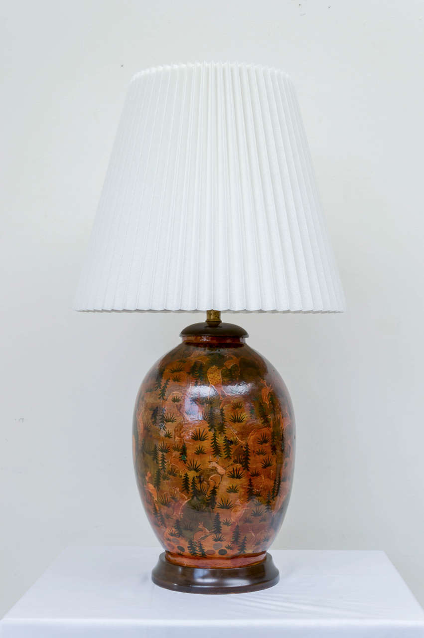 Early 20th century Persian papier mâché vase as lamp. Decoration of animals finely drawn in a richly detailed landscape. Shade included, circa 1920.