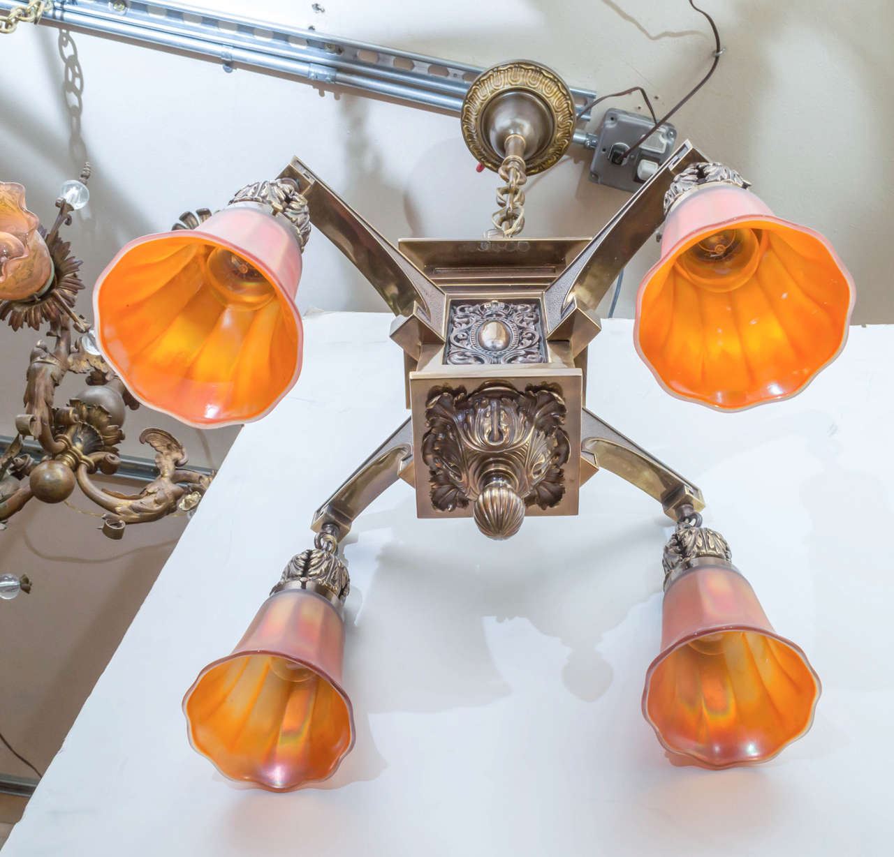 20th Century Exceptional Pair of Arts and Crafts Four-Arm Chandeliers