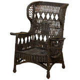 Antique American Wingback Wicker Chair with Magazine Pocket