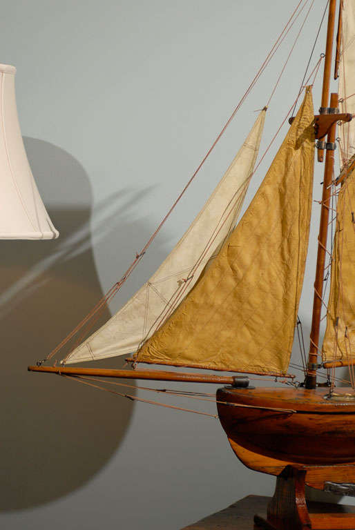 Beautifully hand crafted English pond yacht with sails in great shape.