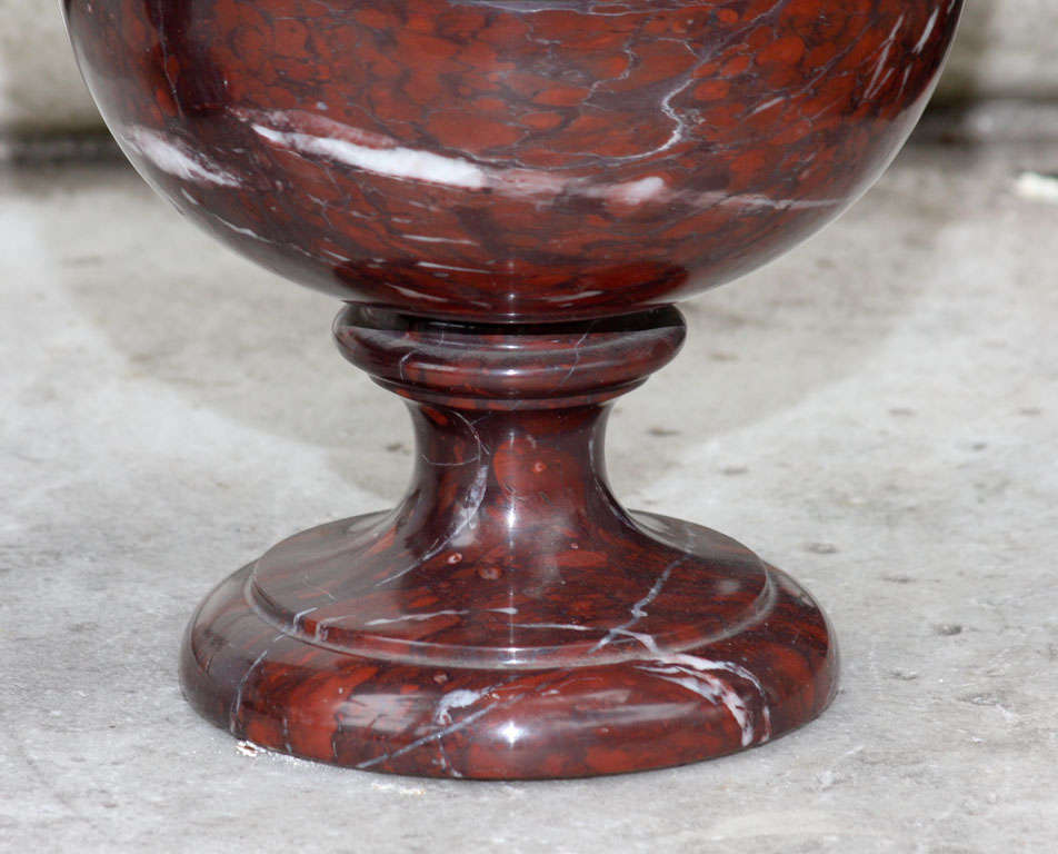 Carved Large Pair Rouge Royale Covered Marble Urns For Sale