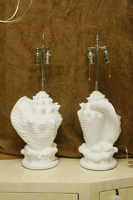 Pair of plaster composition shell lamps.