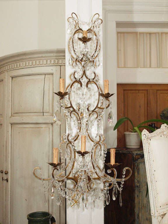 Handcrafted in Italy with vintage Murano glass crystals for Disegno Karina Gentinetta. The frames are new and the sconces are newly constructed out of vintage Murano crystals. Crystals are meticulously hand-knotted and tied and crystal beadings are