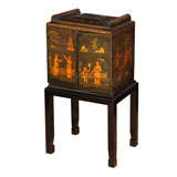 A Regency Ebonized and Chinoiserie Cabinet