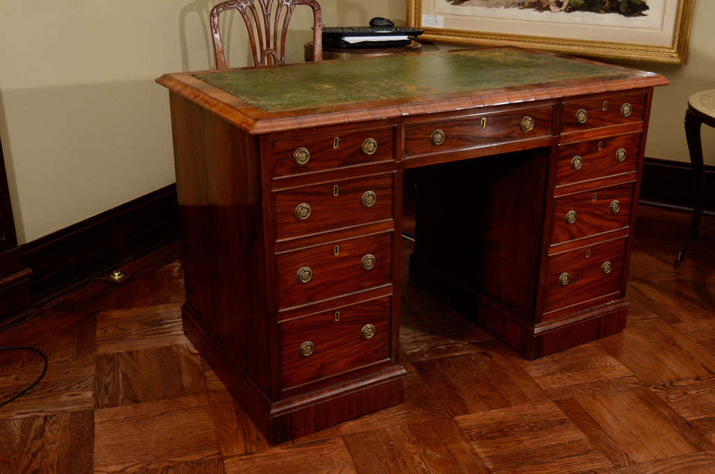 A Victorian Rosewood and Mahogany Pedestal Desk