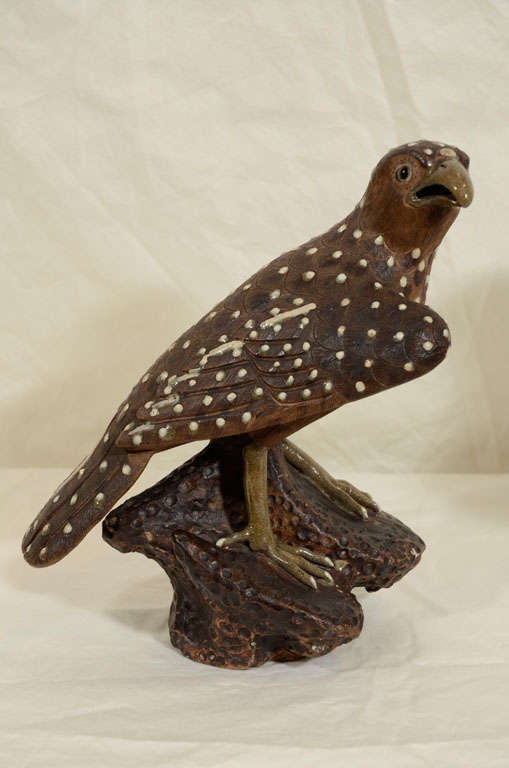 A Pair of  Stoneware Hawks
