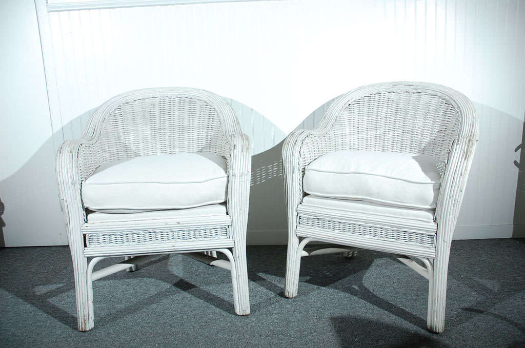 FANTASTIC MATCHING PAIR OF DESIGN WICKER ARMCHAIRS IN ORIGINAL DRY WHITE PAINT.THIS PAIR OF WICKER CHAIRS,POSSIBLY BAR HARBOR ARE IN 19THC WHITE HOMESPUN DURABLE LINEN WITH A WHITE LINEN DECKING TOO.THE CONDITION ARE VERY GOOD AND THE CHAIRS ARE