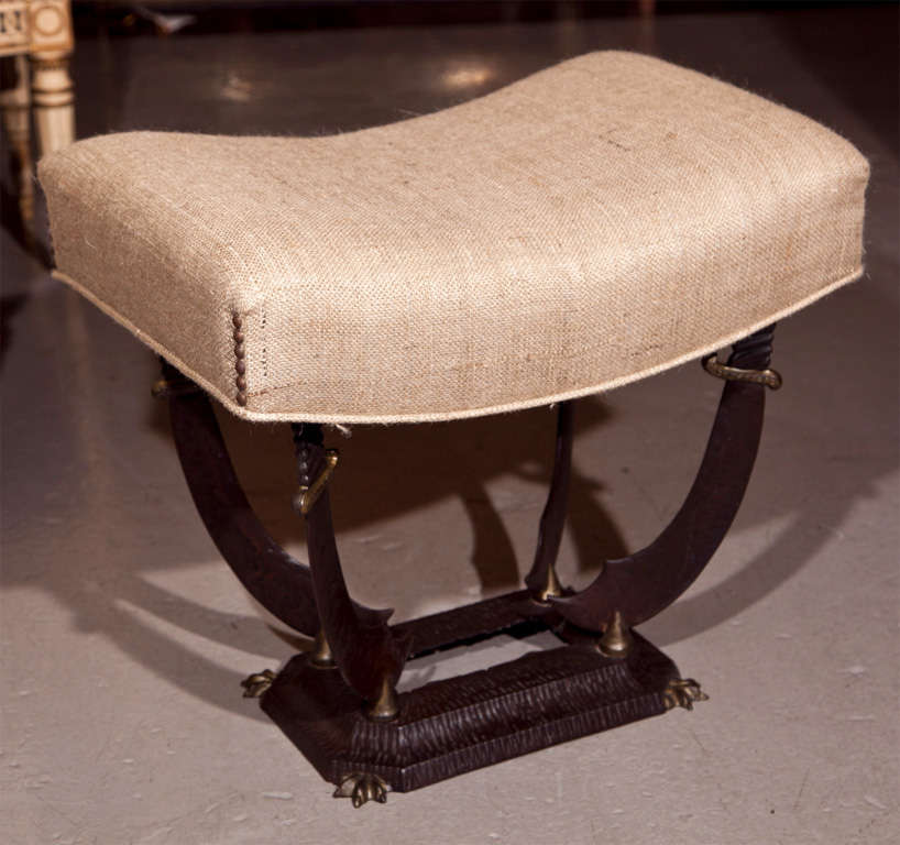 Pair of intriguing vintage Art Deco style benches, circa 1960s, the burlap upholstered seat supported by sword-shaped iron base.