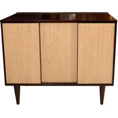 Edward Wormley sideboard with sliding grass cloth doors