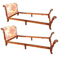 Pair of twin French Provincial swan neck mahogany beds.
