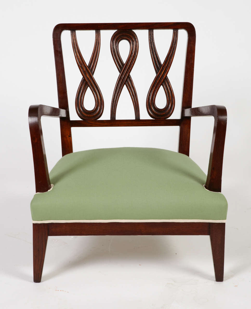 Pair of low armchairs designed by Maurizio Tempestini;
 Unique pair for a private residence in Florence in 1945. Walnut and seat re-upholstered with a green cotton fabric.
Misure:h 76cm 78 x 67.5 cm