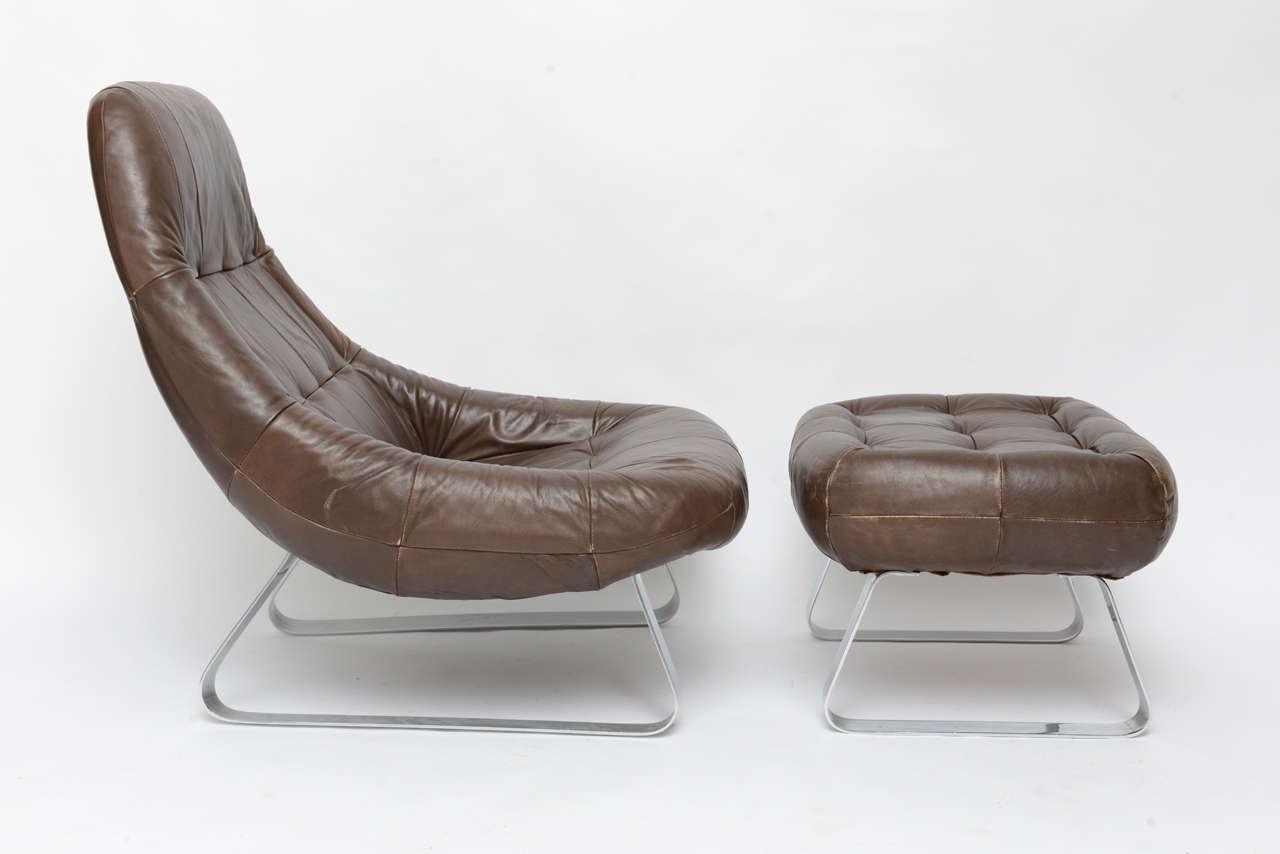 From the Earth Collection, this is an early ergonomically designed lounge chair by designed Brazilian Percival Lafer.