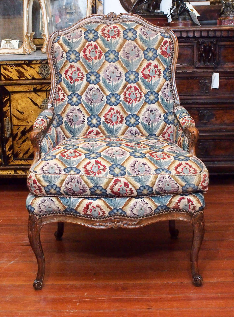 Pair of Period Louis XV Walnut Bergere with Impeccable Needlepoint Upholstery. Large Scale