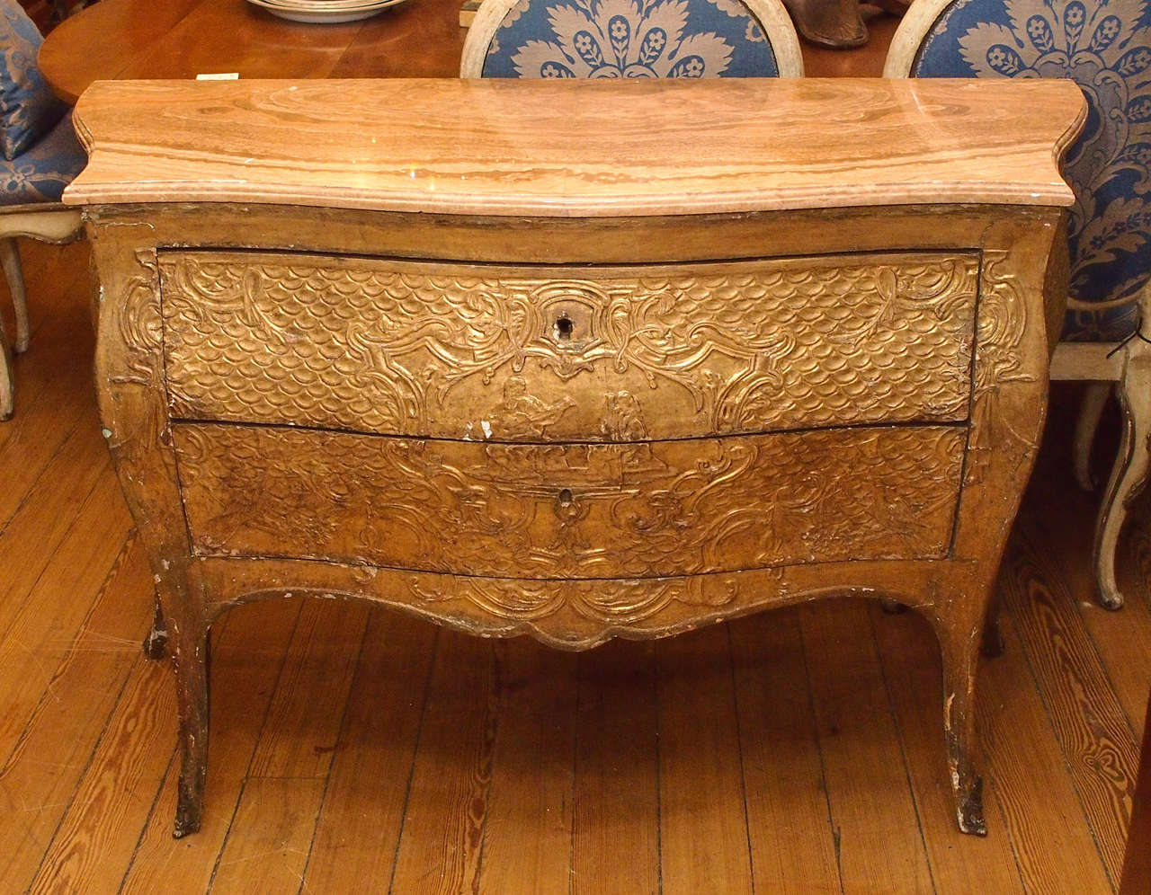 Italian Bombe Strapwork gilt commode with book matched onyx top.
18th c.