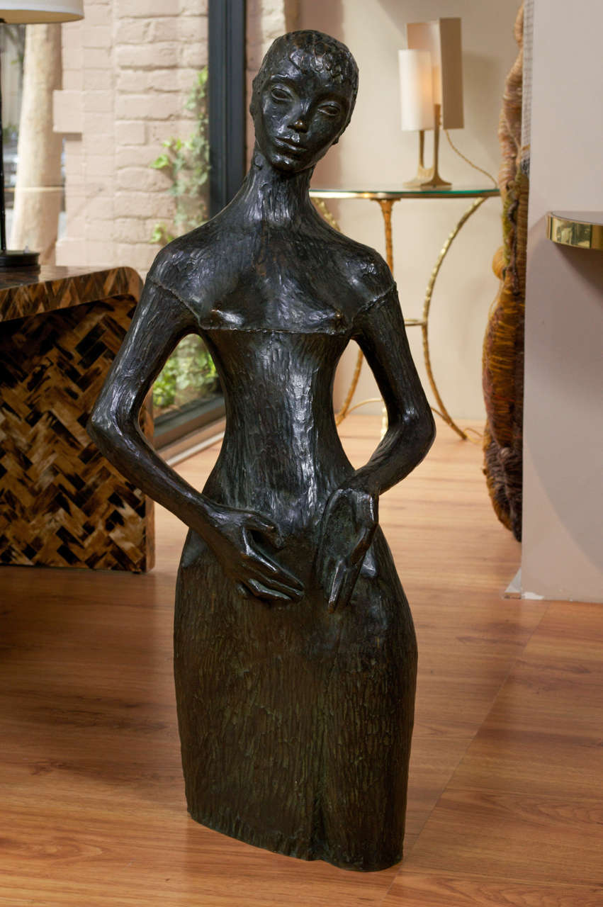 An exceptional, patinated large bronze sculpture of a woman by George Oudot (1928-2004).
Signed, circa 1960.
