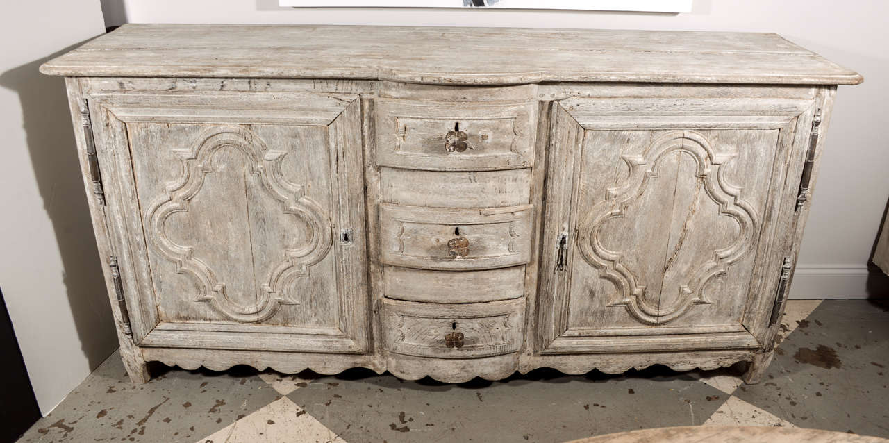 Beautiful 18th century French Oak buffet, remnants of paint at one point.  Very unique hardware.