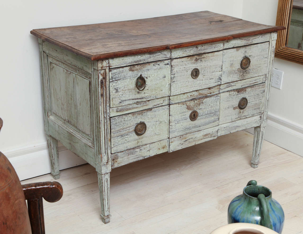 Painted two-drawer commode with wood top, paneled sides and tapered legs