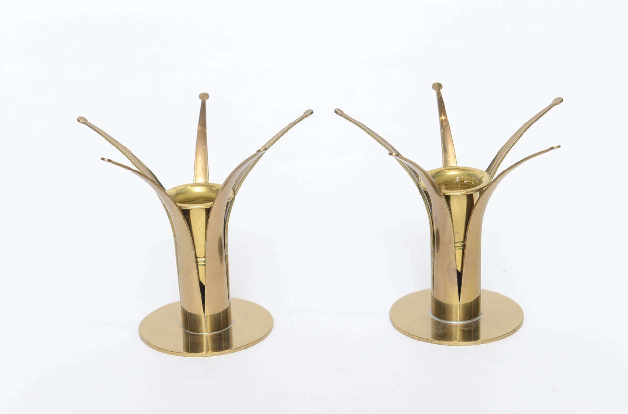 This is a pair of ORIGINAL brass Swedish candlesticks with removeable candle holders, also can be just displayed as lovely brass accents.  Designed as stars or a royal crown, they are simply amazing and well preserved for their age.