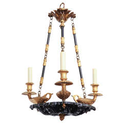 Early 20th Century Black and Gilt Chandelier by E.F. Caldwell