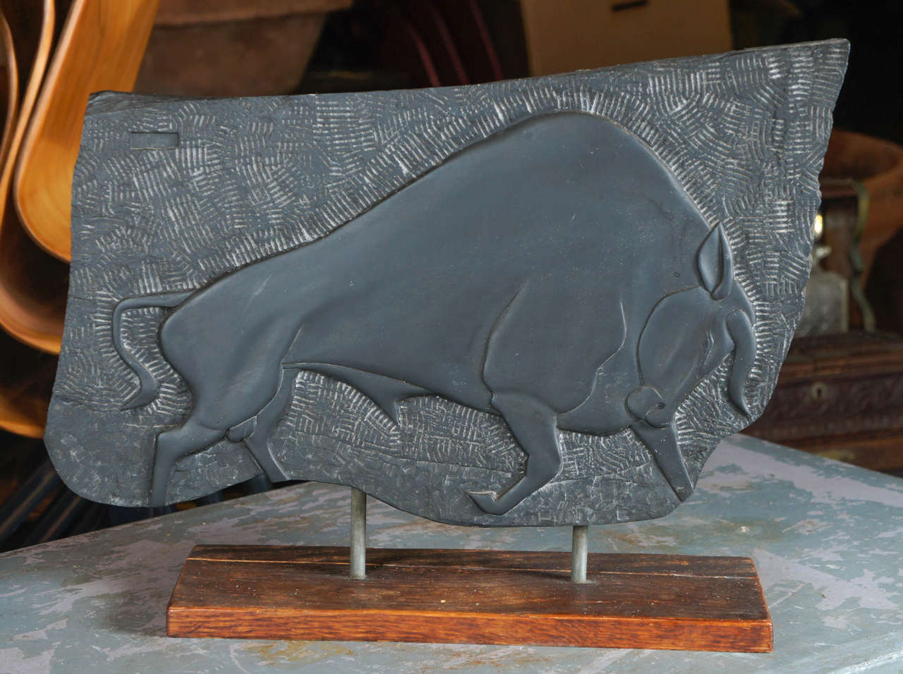 Slate stone carved bull by Williams, signed and mounted on original wood base. Beautifully carved on slate stone, probably around 1950, unique, signed upper left, Williams.