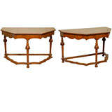 Antique William 
Mary walnut demi-lune tables, a pair