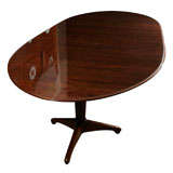 A rare and unusual Dining Table in Rosewood