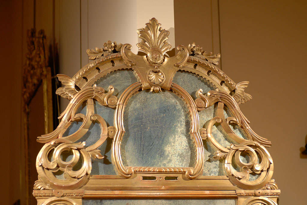 20th Century French Regence Style Gilt Wall Mirror with Antiqued Glass