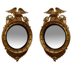 Pair of Regency Style Giltwood Bull's Eye Mirrors with Eagles