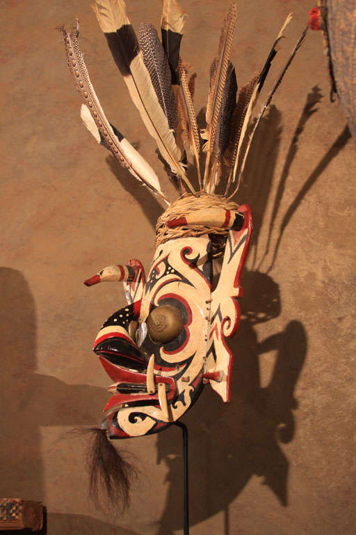 20th Century Ceremonial Mask from Borneo with Feathered Headdress For Sale