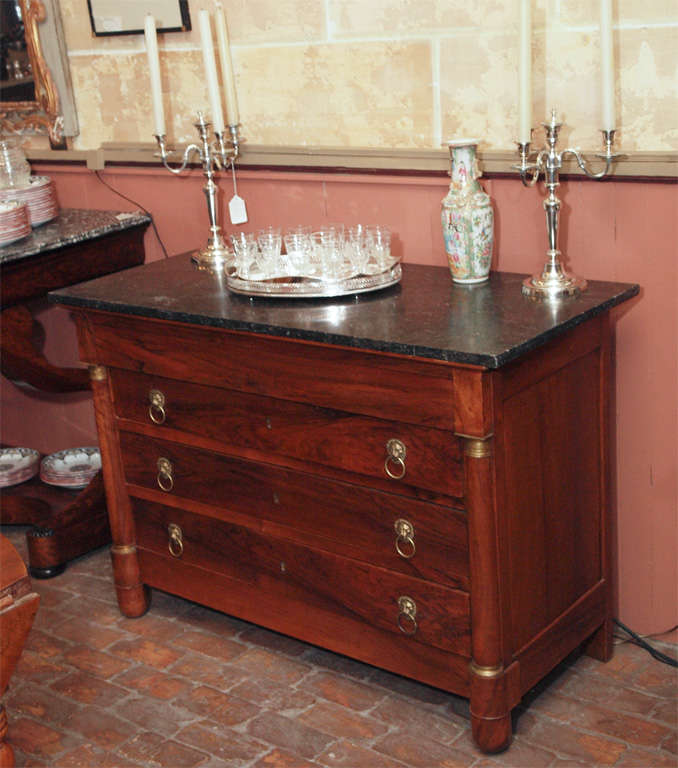 Early 19th century French Empire period mahogany commode with four drawers, bronze dore mounts and pulls and 
