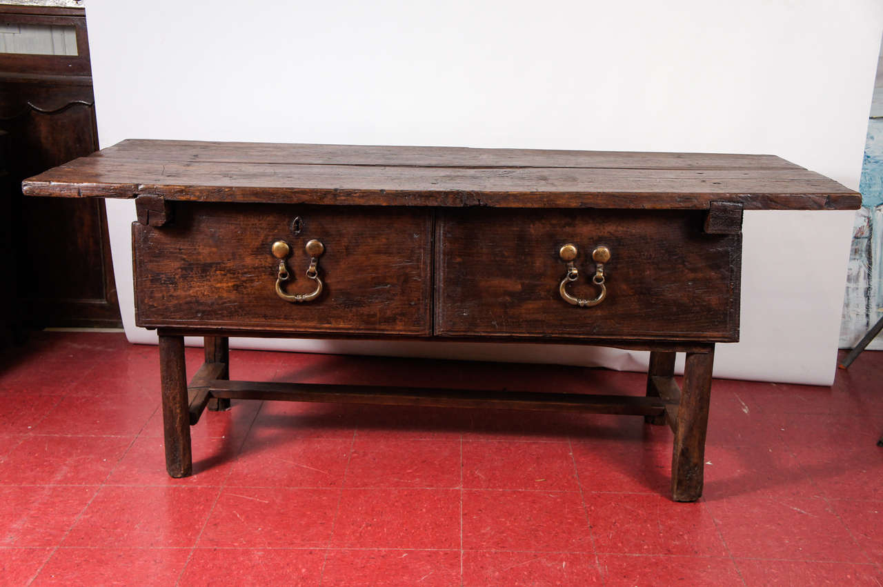 Wonderfully handsome Spanish work table or center island table with original hardware and plank top.  Wonderful patina, also can be terrific as sofa table, console table, sideboard or buffet server.

kitchen island, kitchen work table