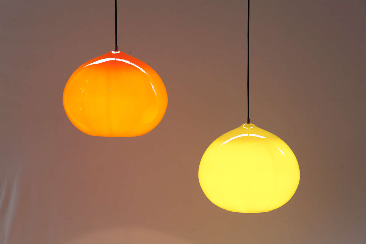 A 1960's colorful pendant executed by Vistosi, glassworks located in Murano (I). Brass fixing with 1 light bulb.