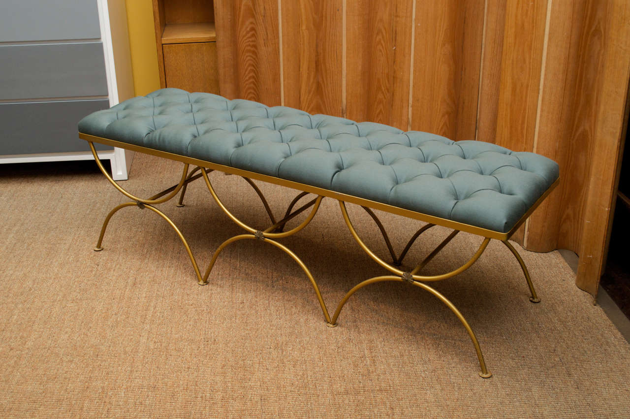 Glamorous gold bench newly upholstered in sea foam green wool.