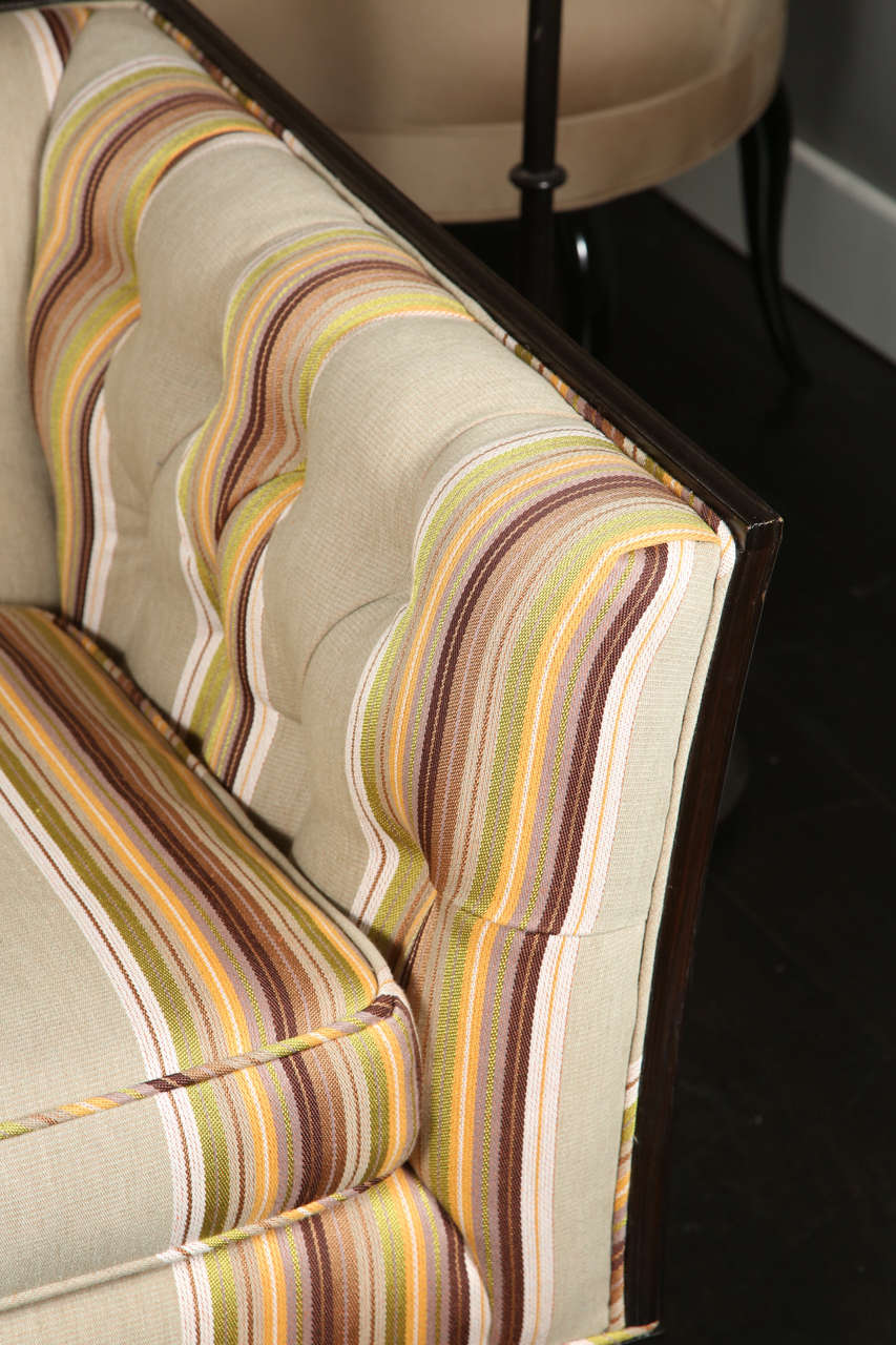 Vintage 1910-1950's newly upholstered in multi-striped fabric with a solid wood frame.
