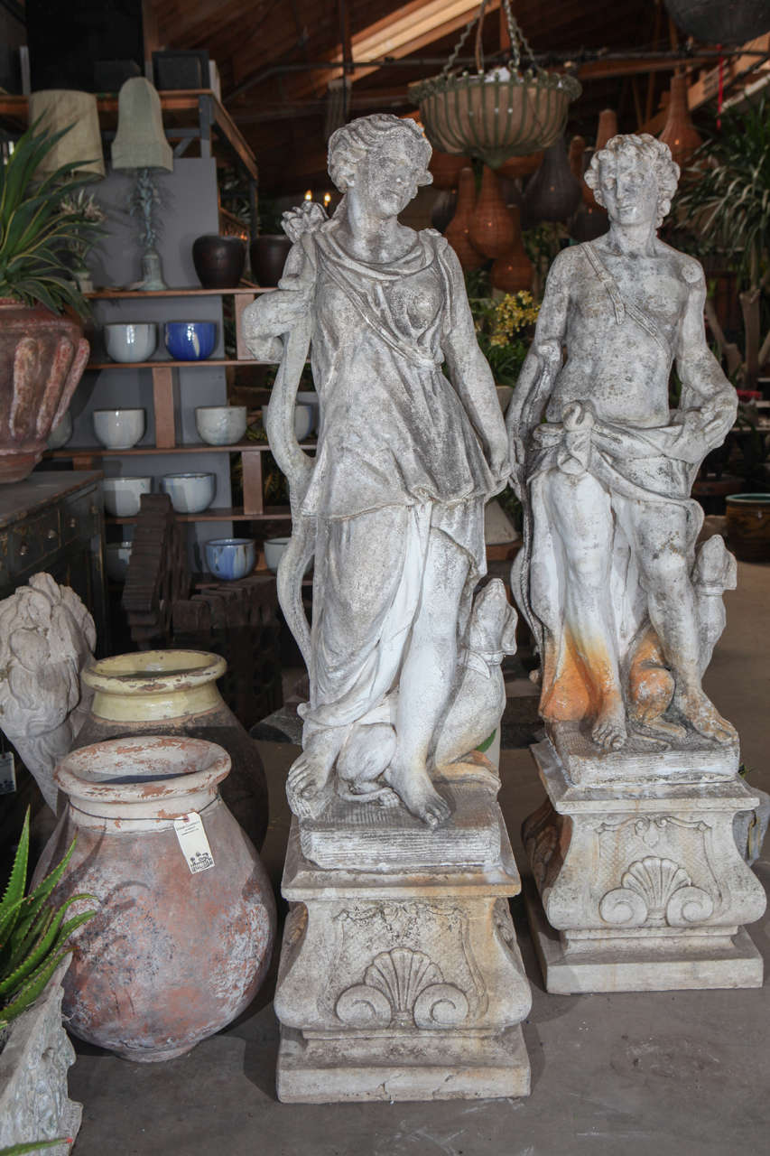 Pair of Cast Stone Male and Female Statues at 1stdibs