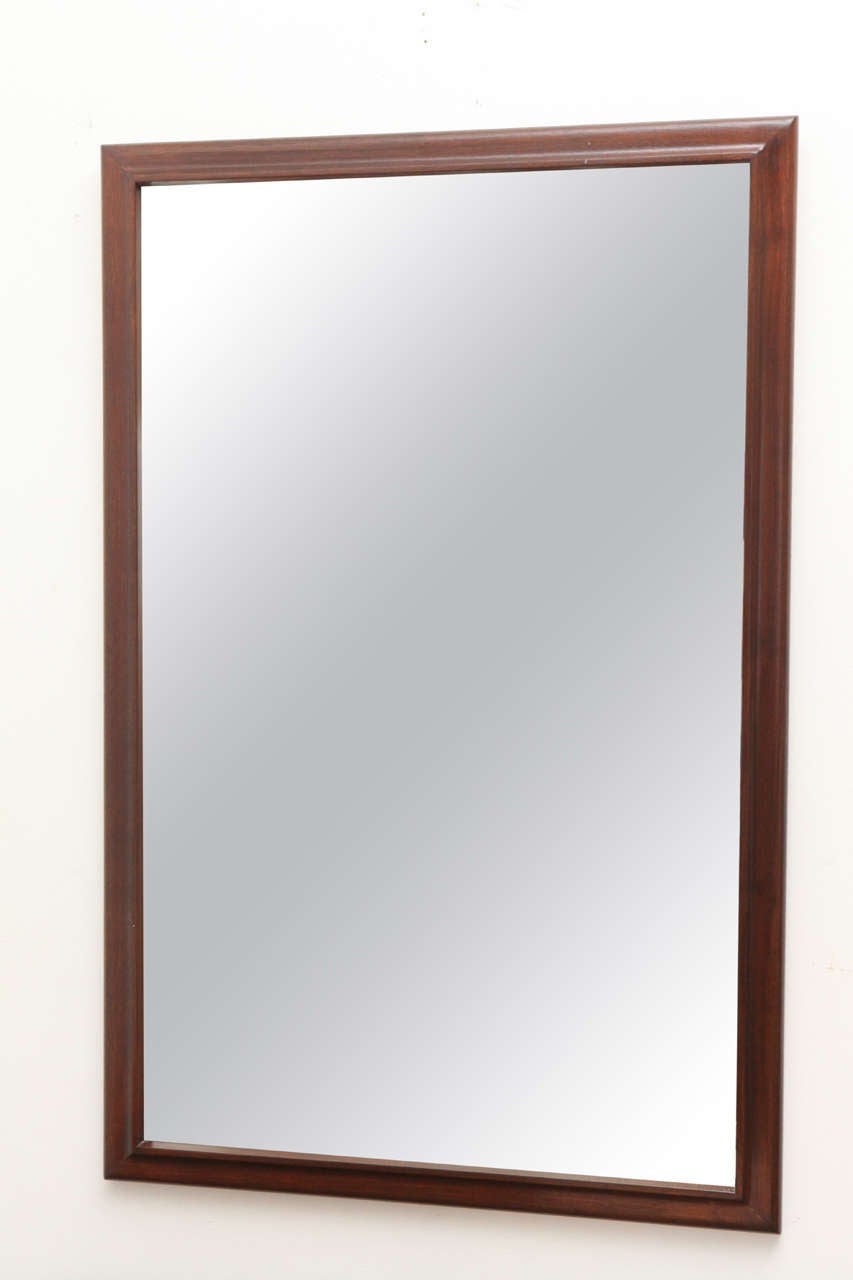 A gorgeous and classic mirror for the bedroom, hallway, dining or living room, over a fireplace. The piece can be hung both vertically or horizontally and the glass is in perfect, unblemished condition.