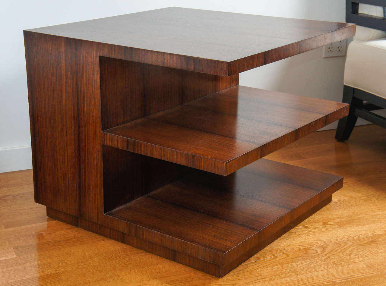 Modern mahogany, cube table with appealing and generous, deep shelves.