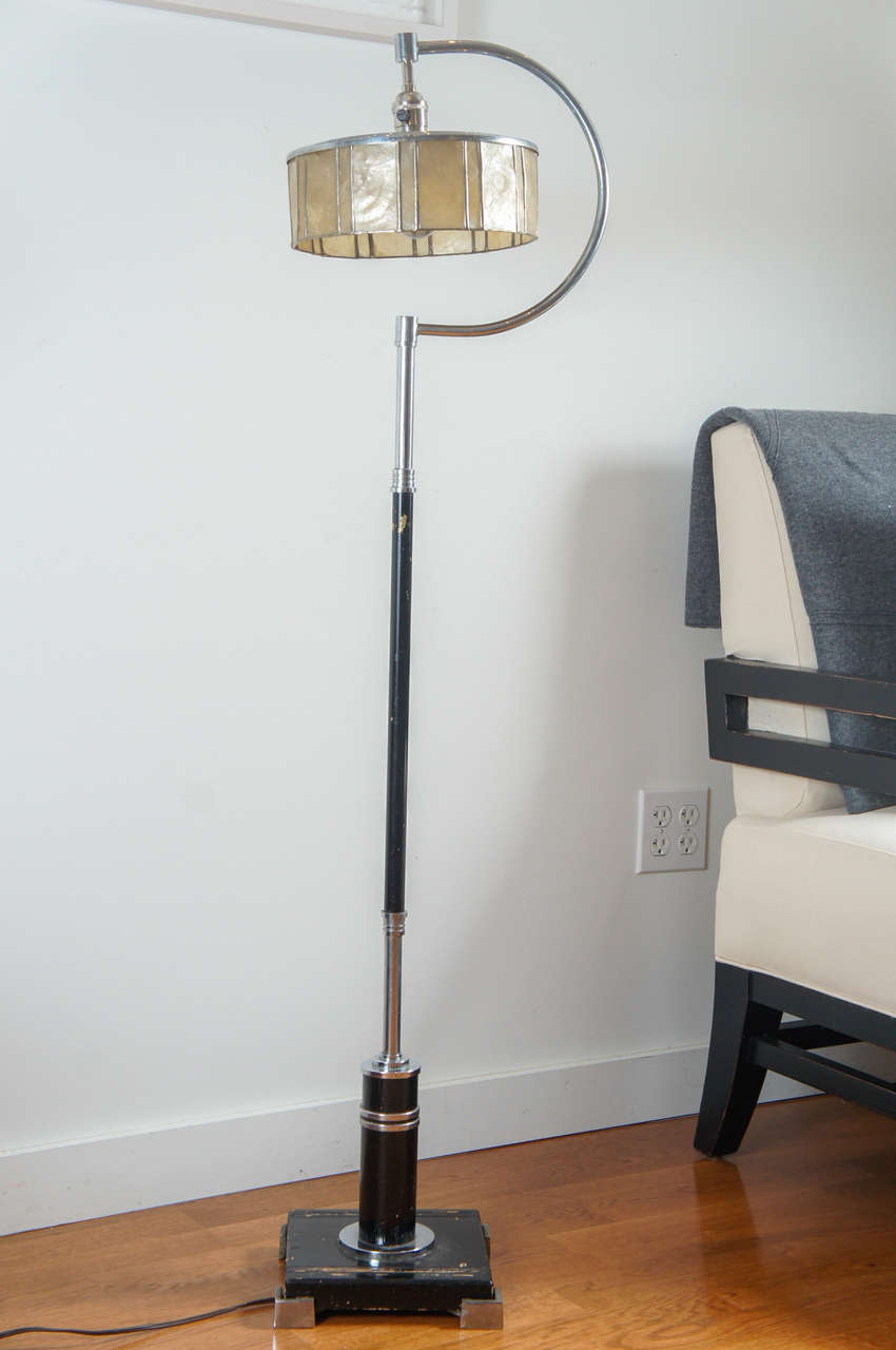 Charming, Art Deco floor lamp with mica shade.
Stands on a square, 9