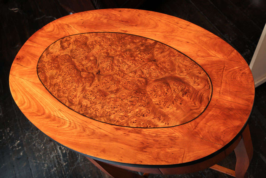 Viennese Biedermeier,  Cherry wood and burl poplar oval table with two drawers