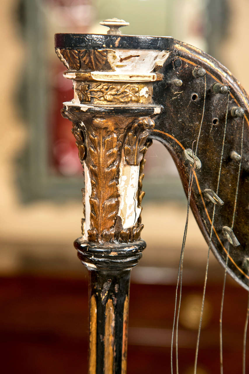 A very finely inlaid Harp Lute possiblly by Edward Light. This Fine stringed instrument stands on its on and is in relatively good condition for its age. The harplike pillar supports diatonically tuned bass strings to extend the range of the fretted