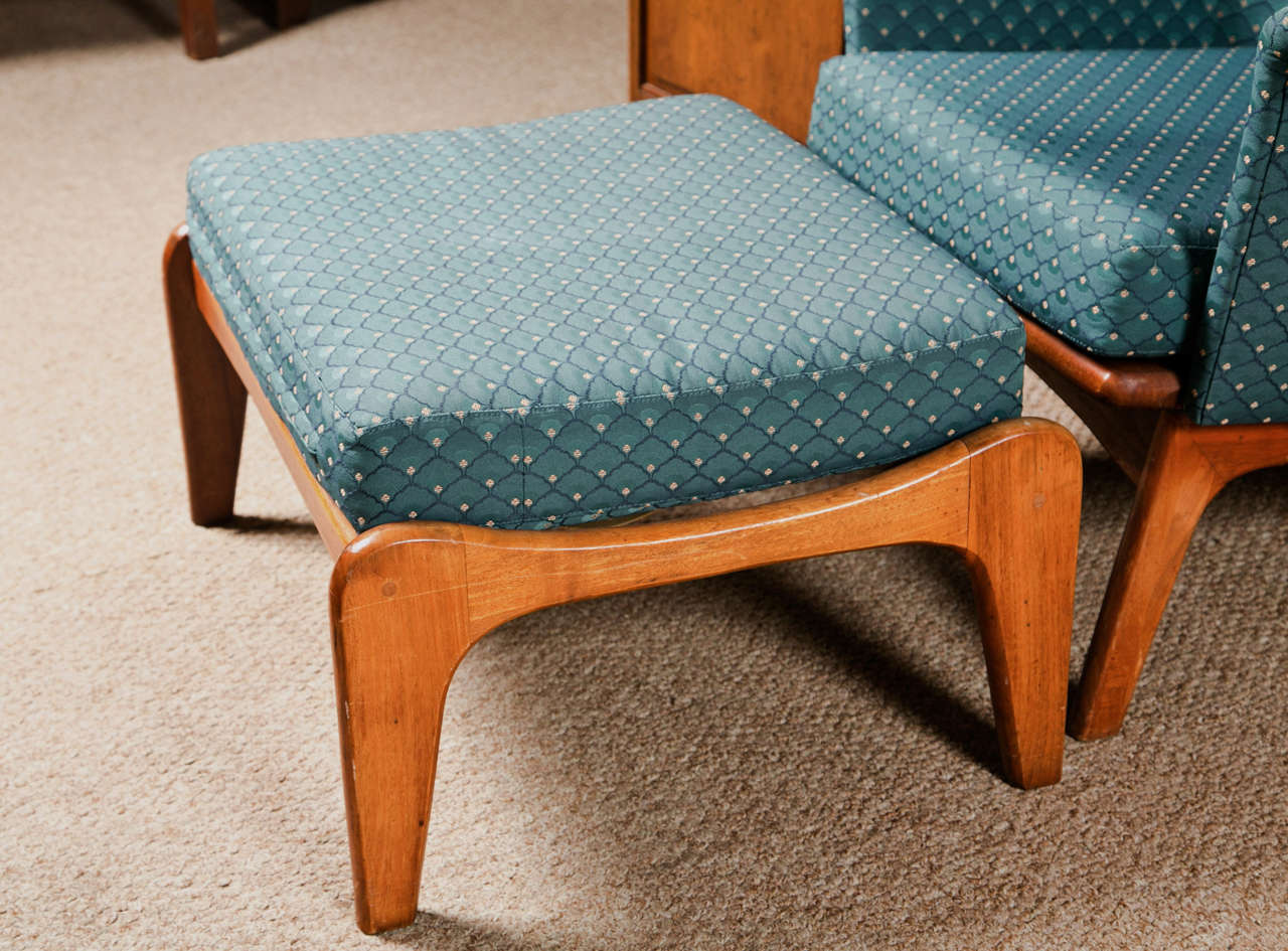 Danish mid-century modern teak lounge chair and matching stool, each upholstered blue fabric, cushioned seat, pegged legs, chair is very comfortable. This chair is American by Adrian Pearsall 

Dimension ottoman: 21 depth, 25 width, 15Height