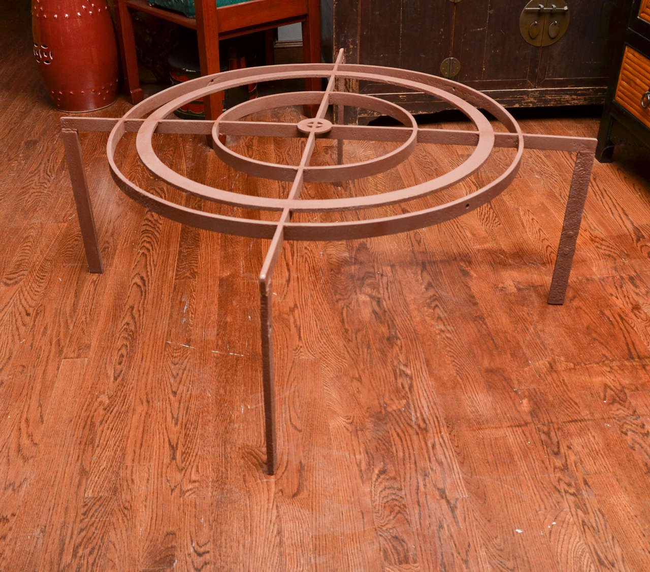 Turn of the century French iron grate coffee table in concentric circular form.